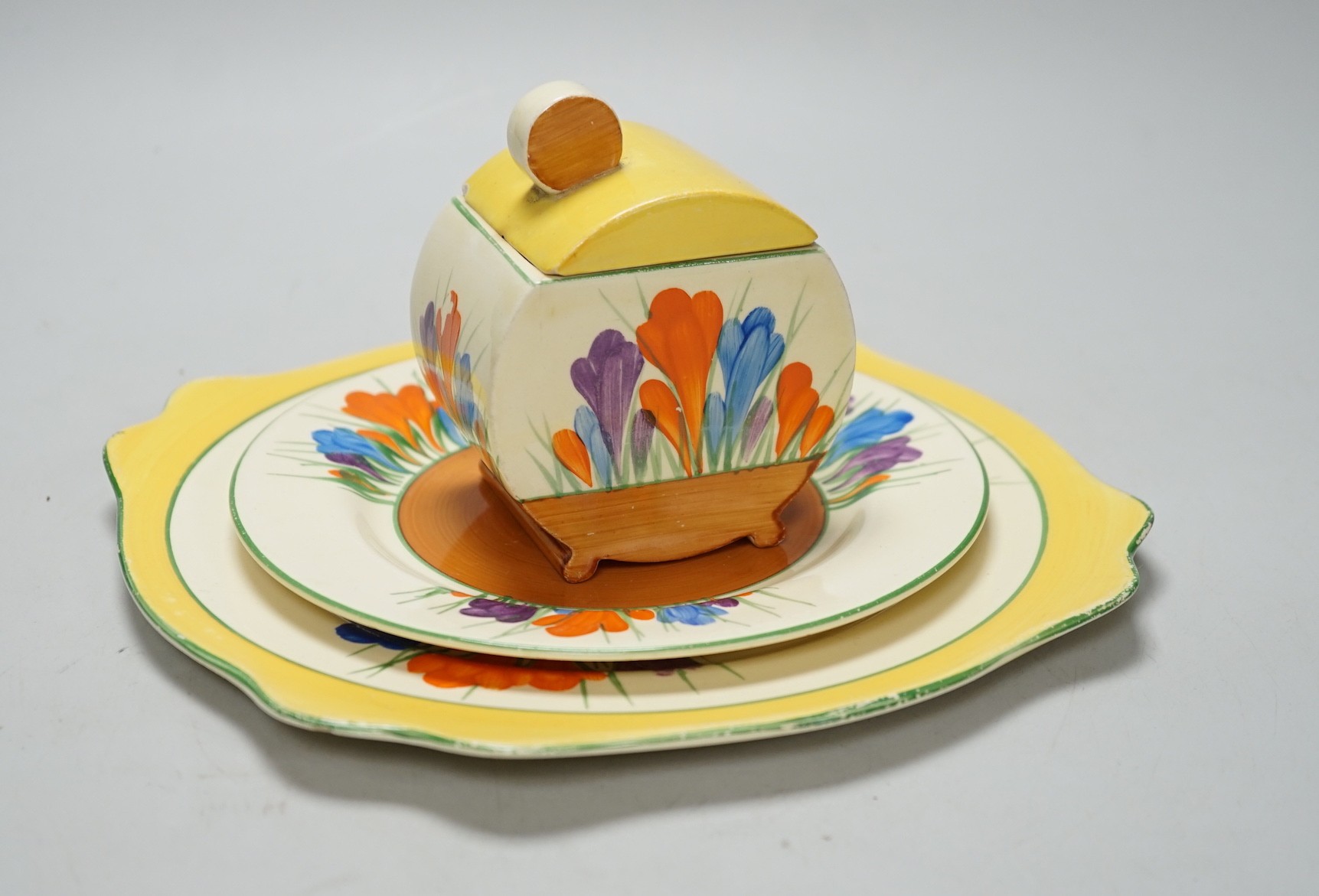 A Clarice Cliff seventeen piece Autumn Crocus part teaset, including a preserve jar and cover